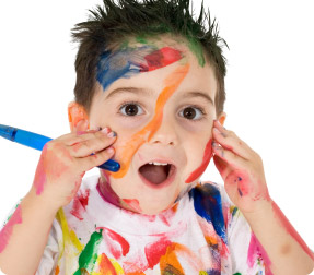 Child with paint all over his face